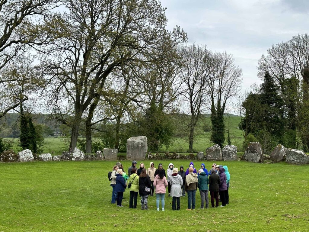Ancient Celtic stone circle at sunrise symbolizing Celtic spirituality and sacred connection