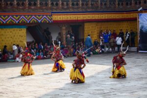 The Tsechu Festival dancers during Spirit Tours Bhutan spiritual journey