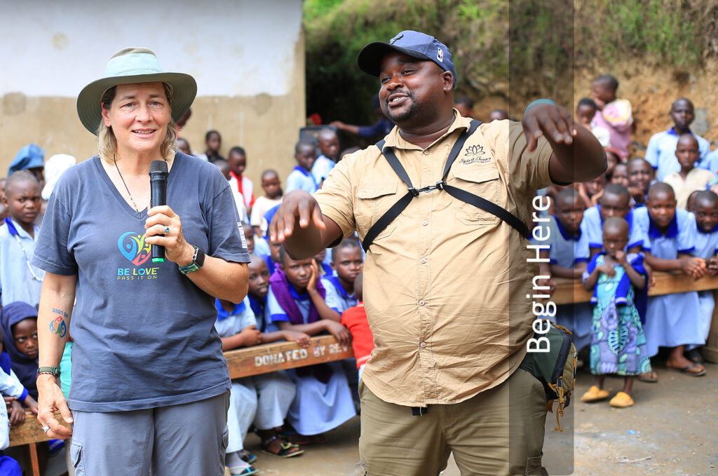 Rev. Karen Fry with a Spirit Tours local guide surrounded by schoolchildren at the Murushasha Primary School in Uganda.